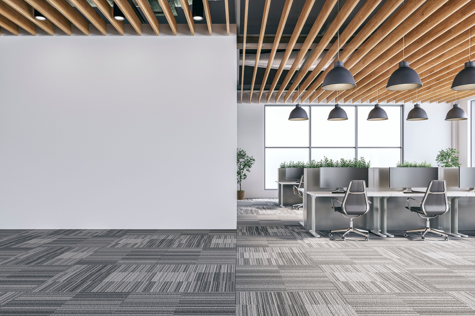 Semi-empty office interior with white wall and copy space,  a wooden slats ceiling, work desks and large windows, on carpet floor